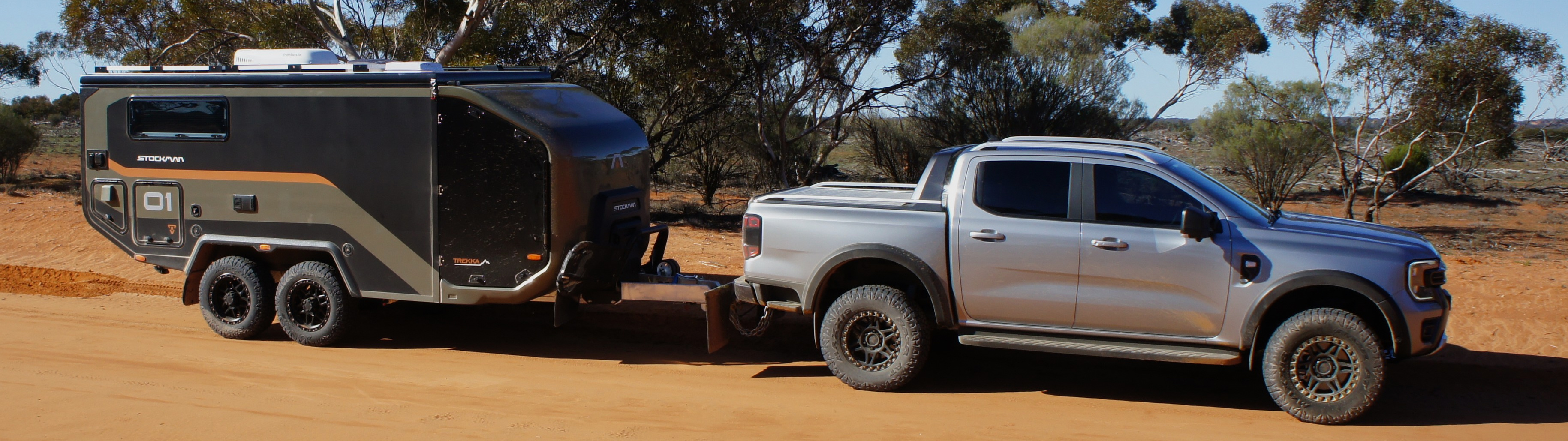 Stockman Trekka towed behind a Ford Ranger on an outback track