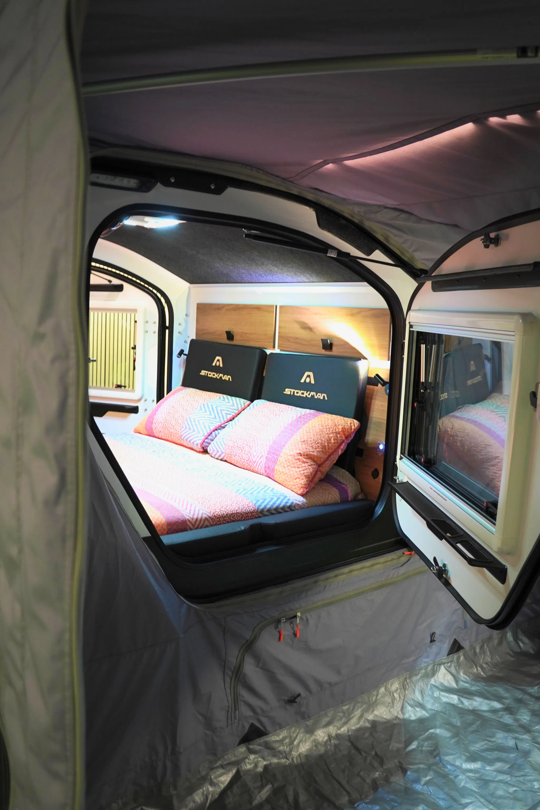 View from inside the change room through the open Rover side door to the bed