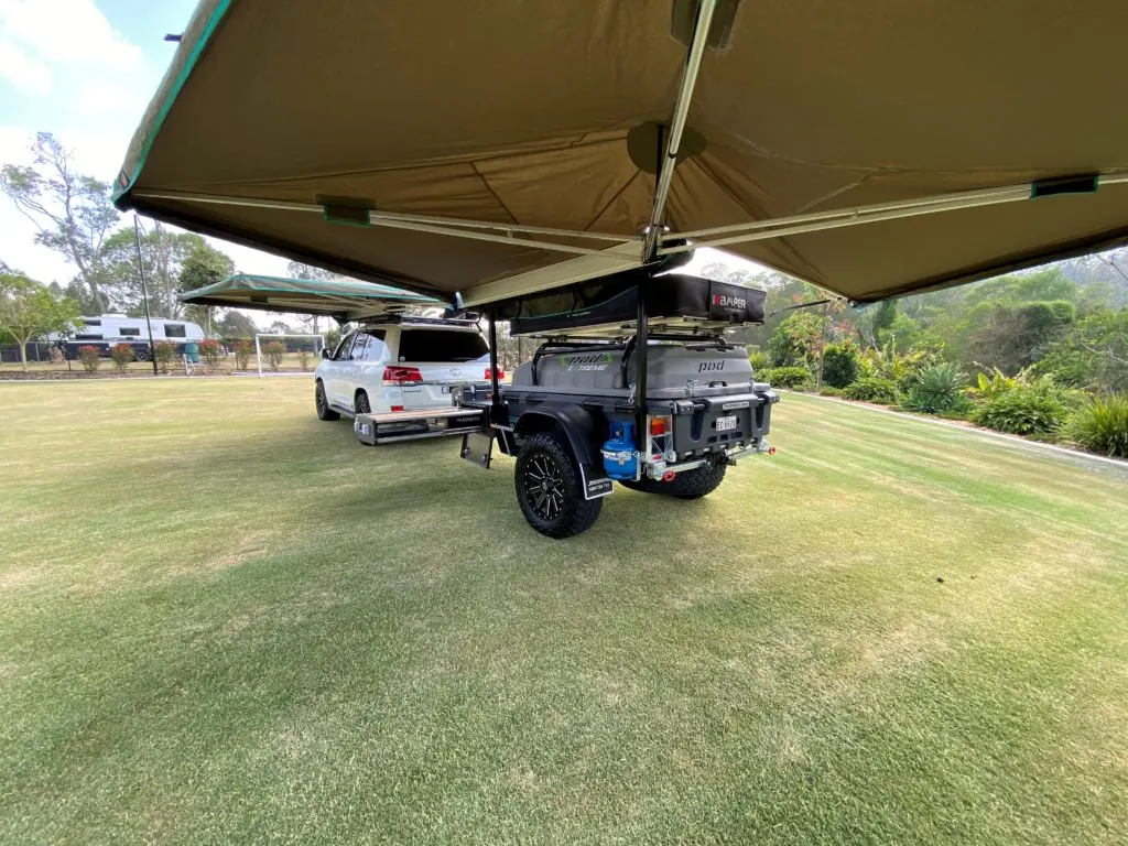 Darche swing awning extended from a Pod Trailer