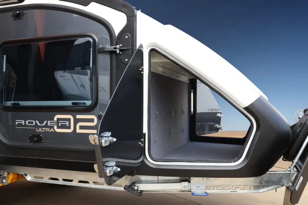 Rover 02 dust-proof external storage box open behind the cabin