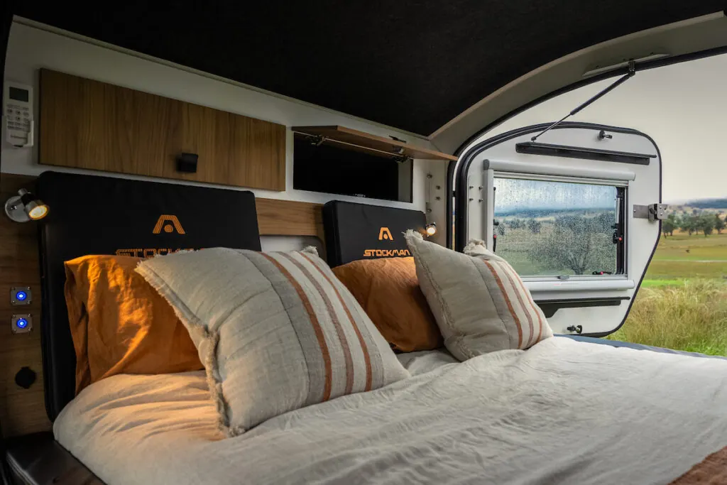Inside the Stockman Rover 02 insulated cabin with queen inner-spring bed