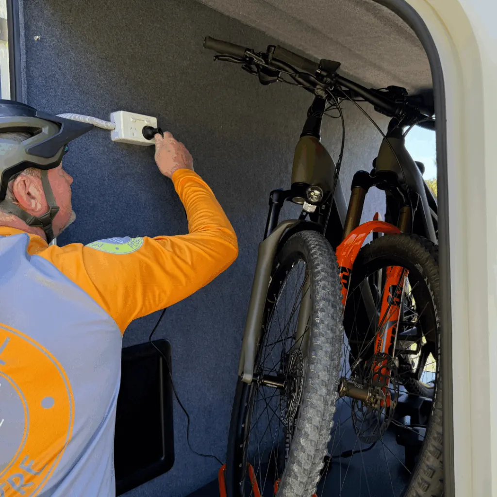 Two e-bikes secured inside the Trekka 01 fibreglass nosecone toolbox